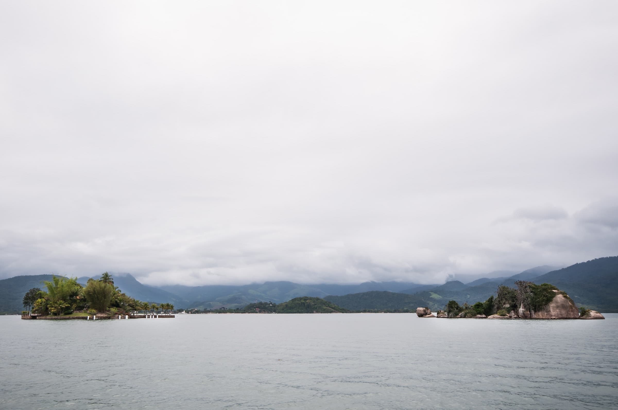 Islands standing in a misted bay at Paraty, Brazil